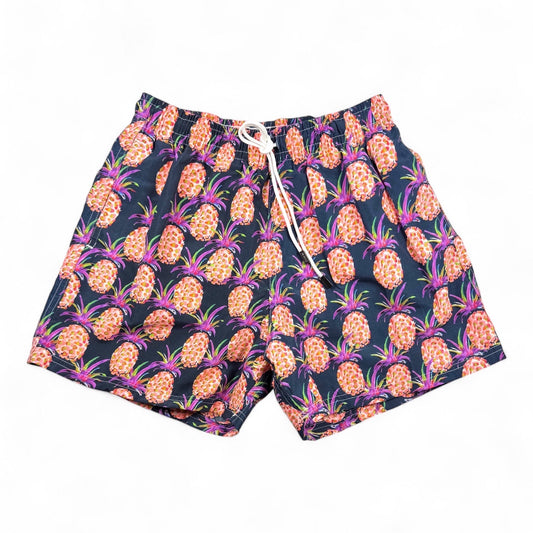 98 Coast Av. men's navy blue swim shorts with tropical pineapple print, elastic waistband and white drawstring, front view
