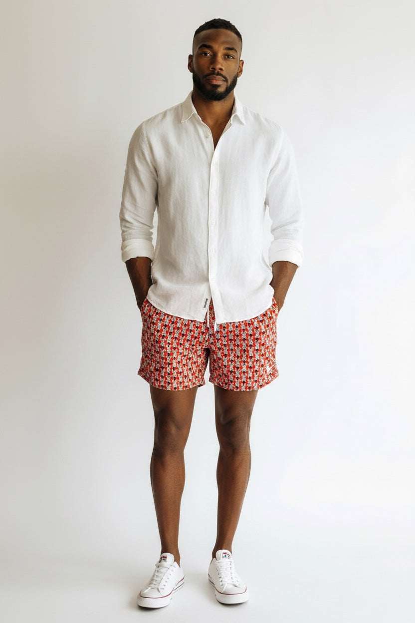98 Coast Av. men's red zebra print swim shorts with elastic drawstring waistband, model, white shirt, front view